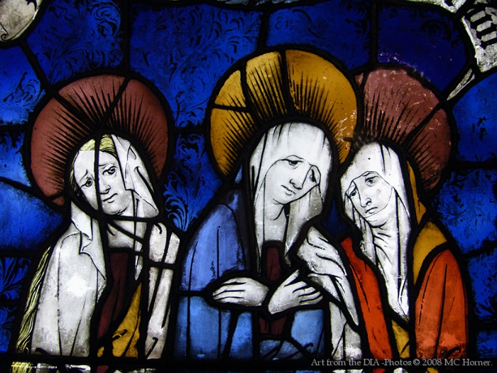Sad stained glass window. The Three Marys.