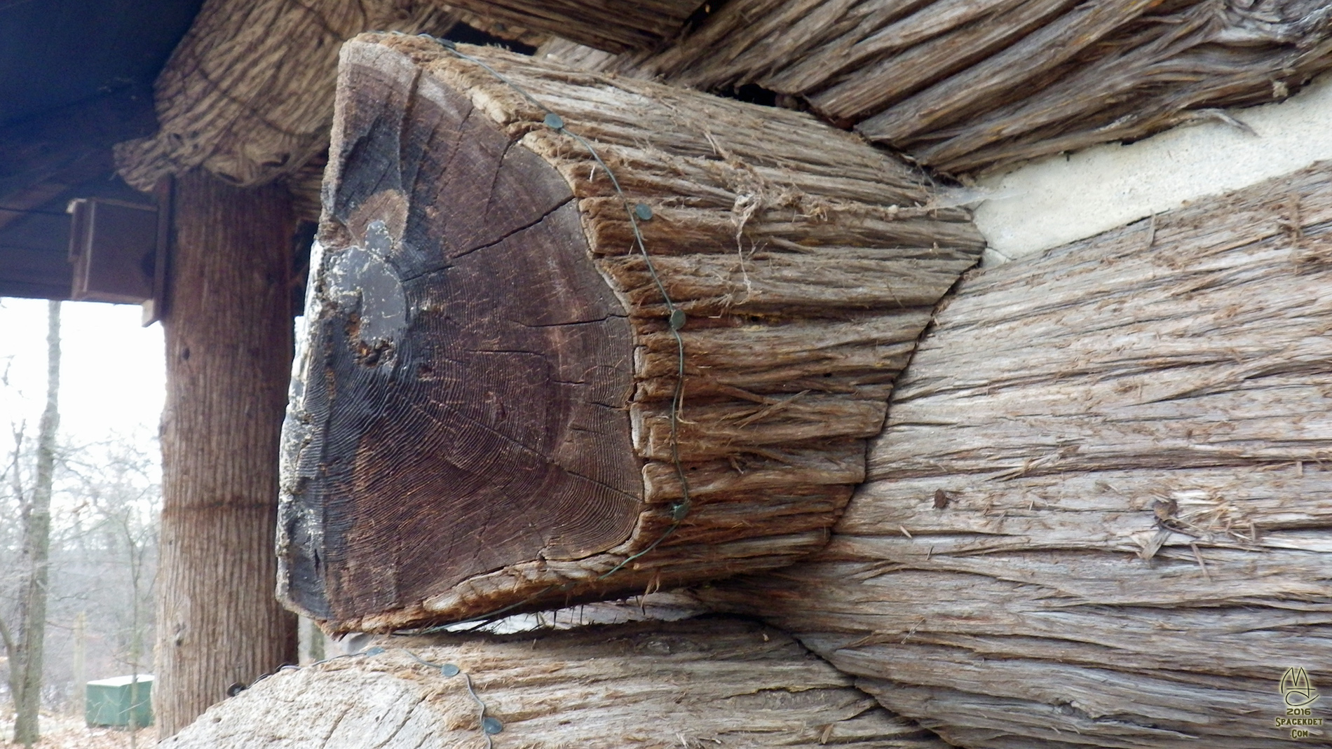 Cedar bark, nail and wire detail.