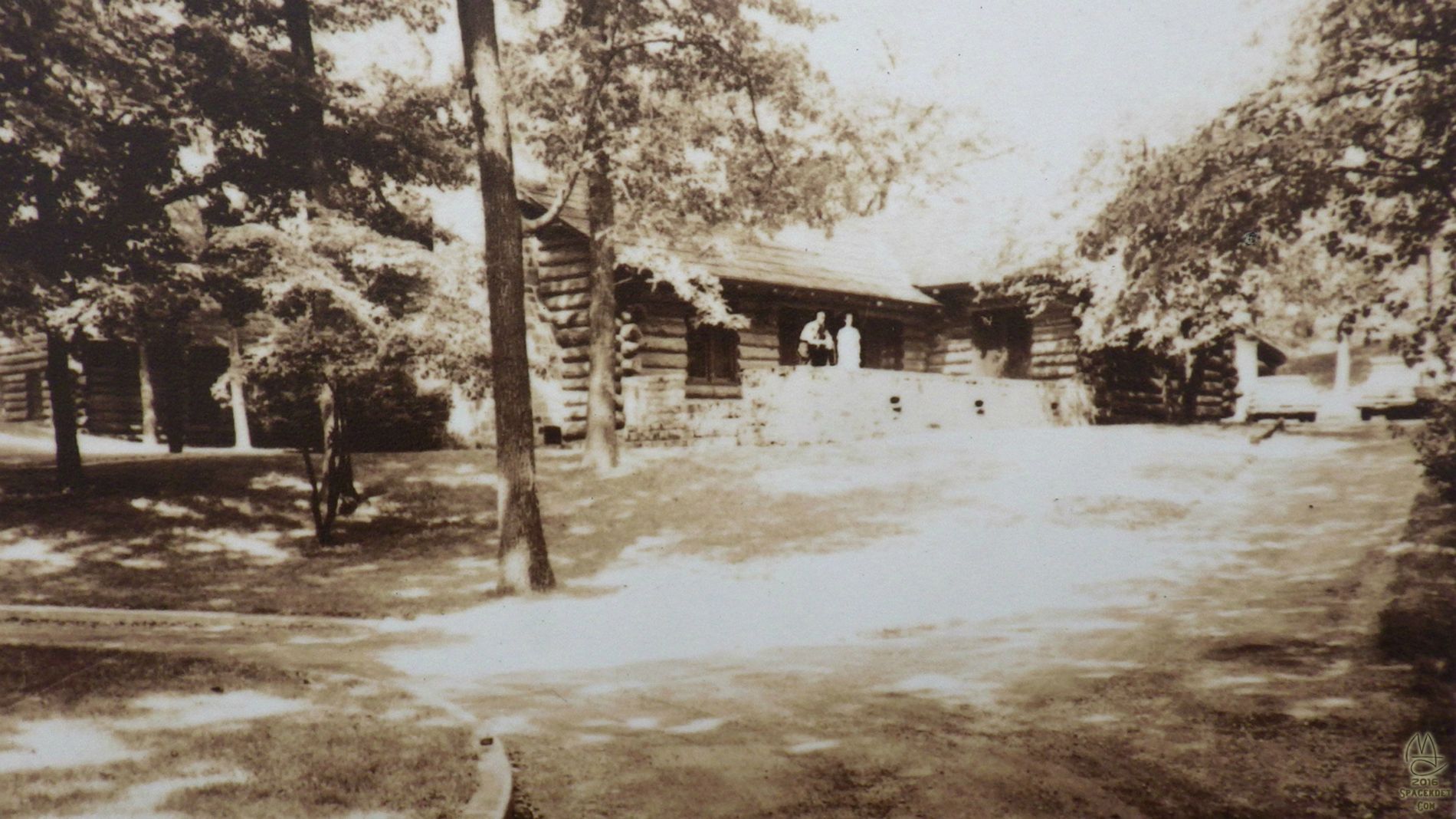 Explanatory marker, detail. Historic photo.