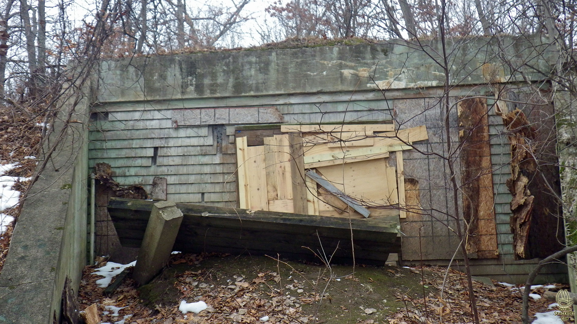 Entrance to underground backup electrical generator. Had a peek in here in the 1990's and I believe it was powered by an Model A engine on a stand.