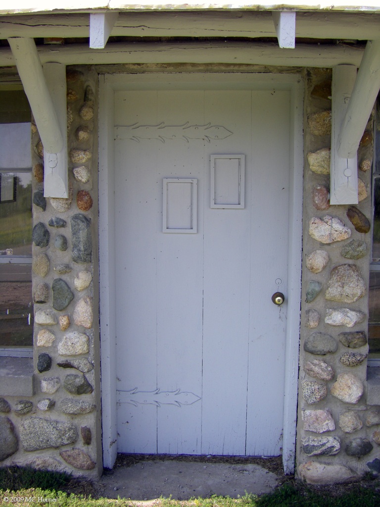 Front door, east / road side.