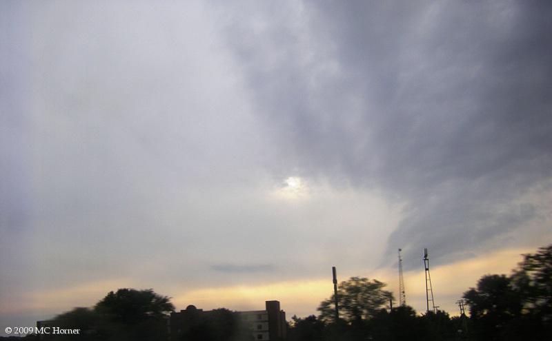 Smudgy skies on the road to Grayling, somewhere near Birch Run, Michigan. 