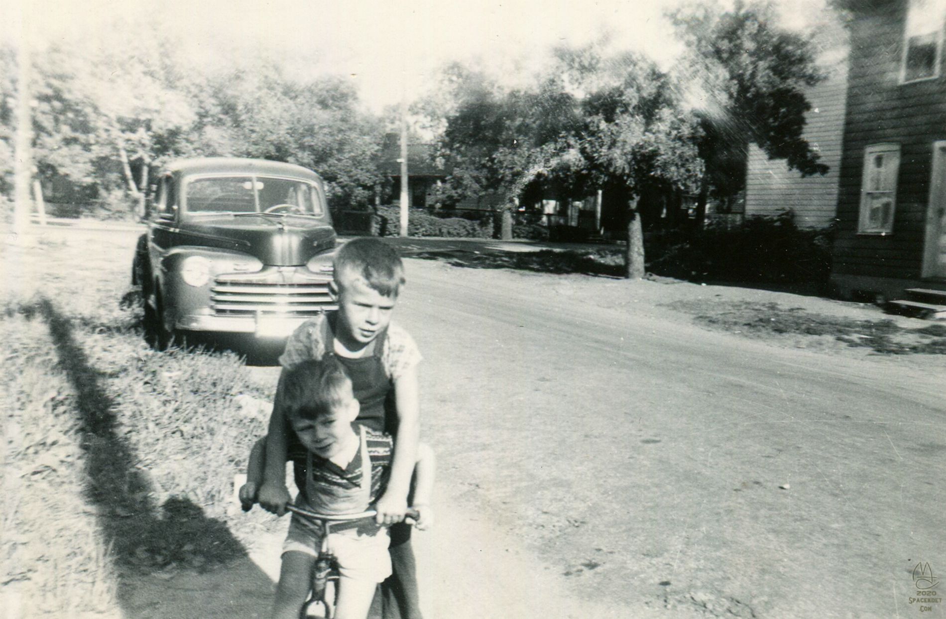 That face when you have to share your bike with your brother.