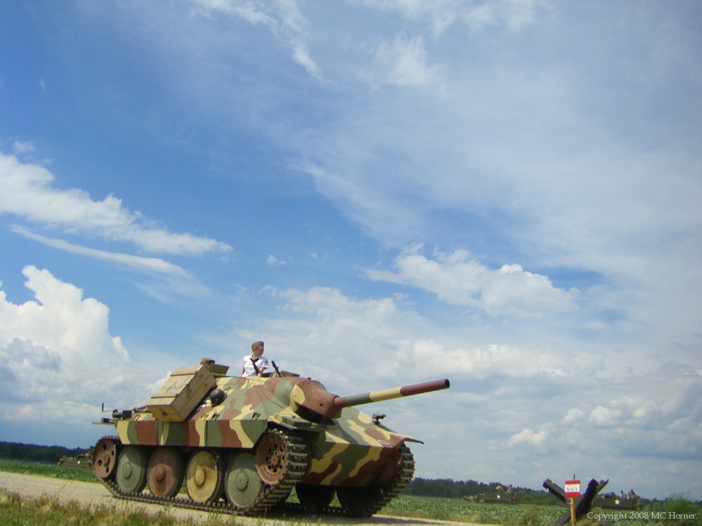 Tank, Ground battle re-enactors in action.