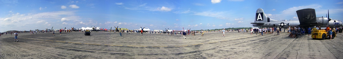 P-51 Mustang lineup anchored by B-29.  See it huge.