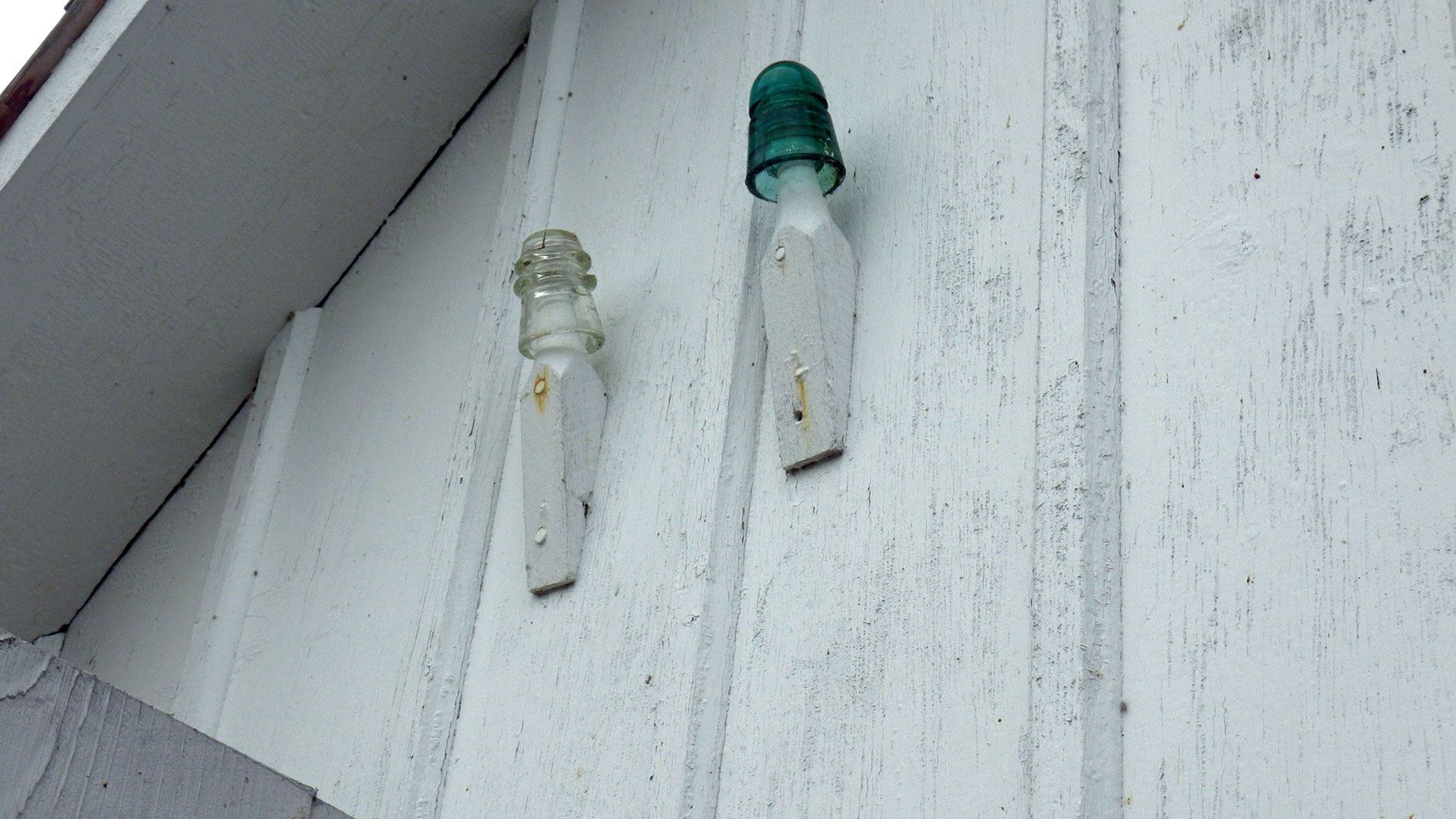 Glass insulators on the boathouse.