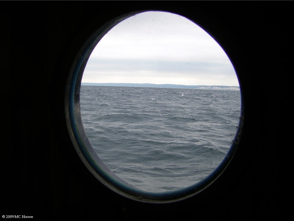 Porthole view of the Sleeping Bear Dunes.