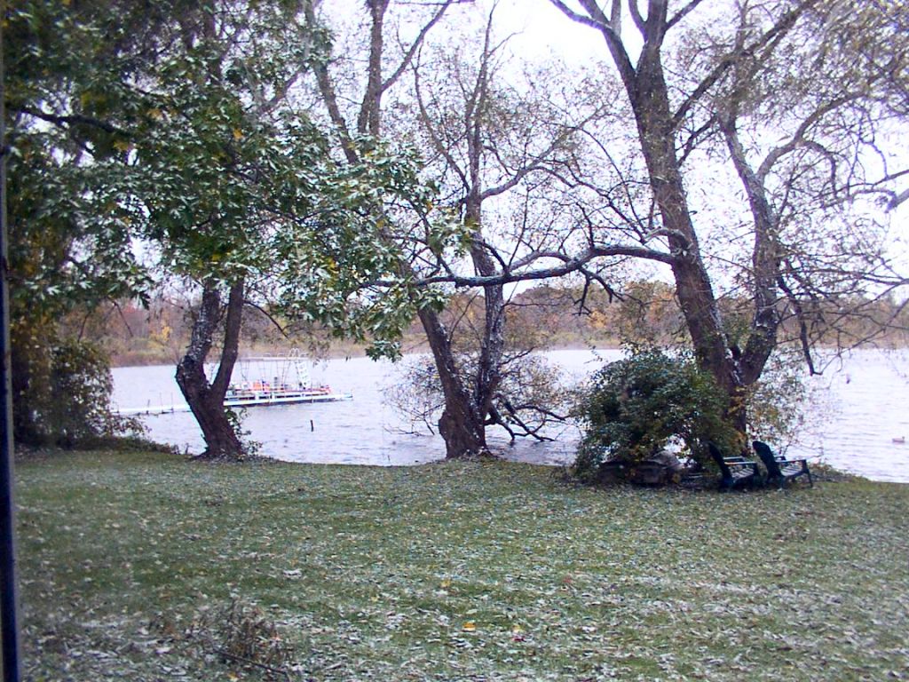A dusting on the grass, and the far side of the lake reappears.