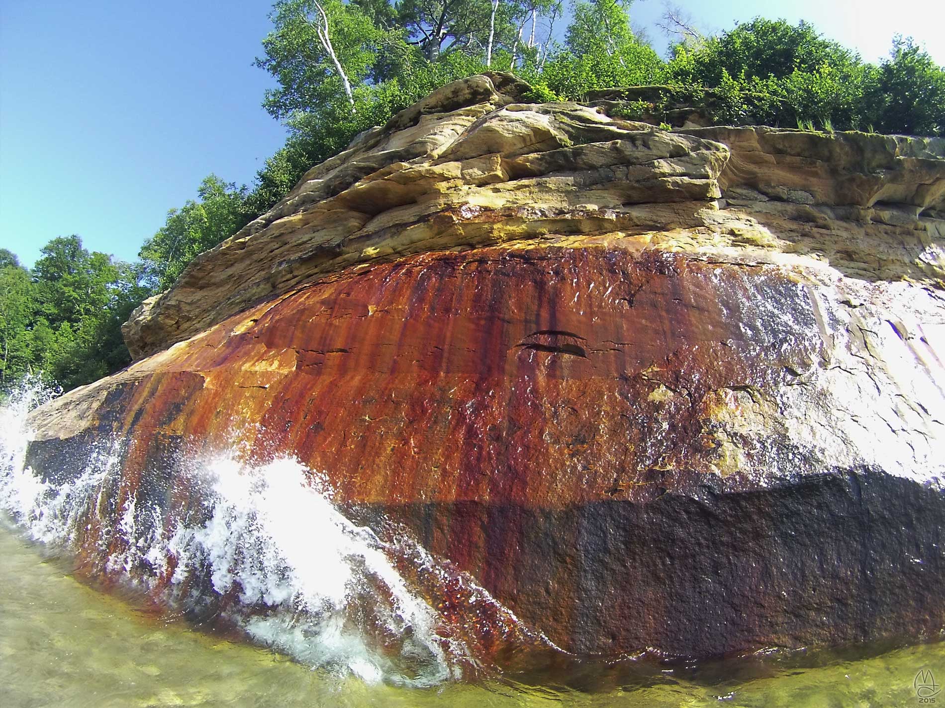 Waves slap the rock. Watch a video  here.