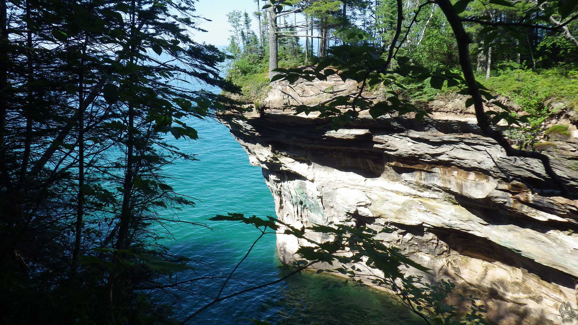 First point west of Chapel Beach.