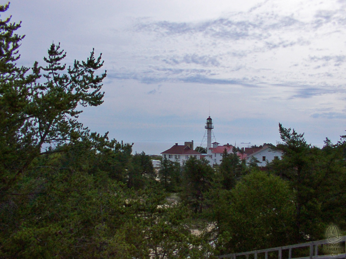 Freighter passing Whitefish Point Light Station, Paradise, Michigan