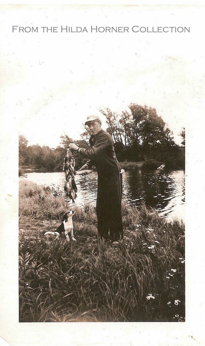 My uncle with a nice string of fish and the ever-present beagle.