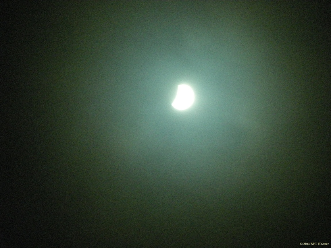 The only decent shot of the lunar eclipse that I got before the clouds thickened up.