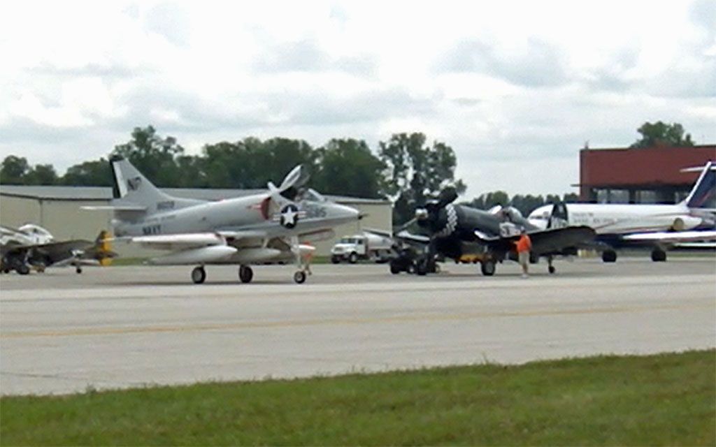 A-4B Skyhawk and Chance Vought F4U Corsair taxi out for the Heritage Flight. To see the 16 MB WMV video click here