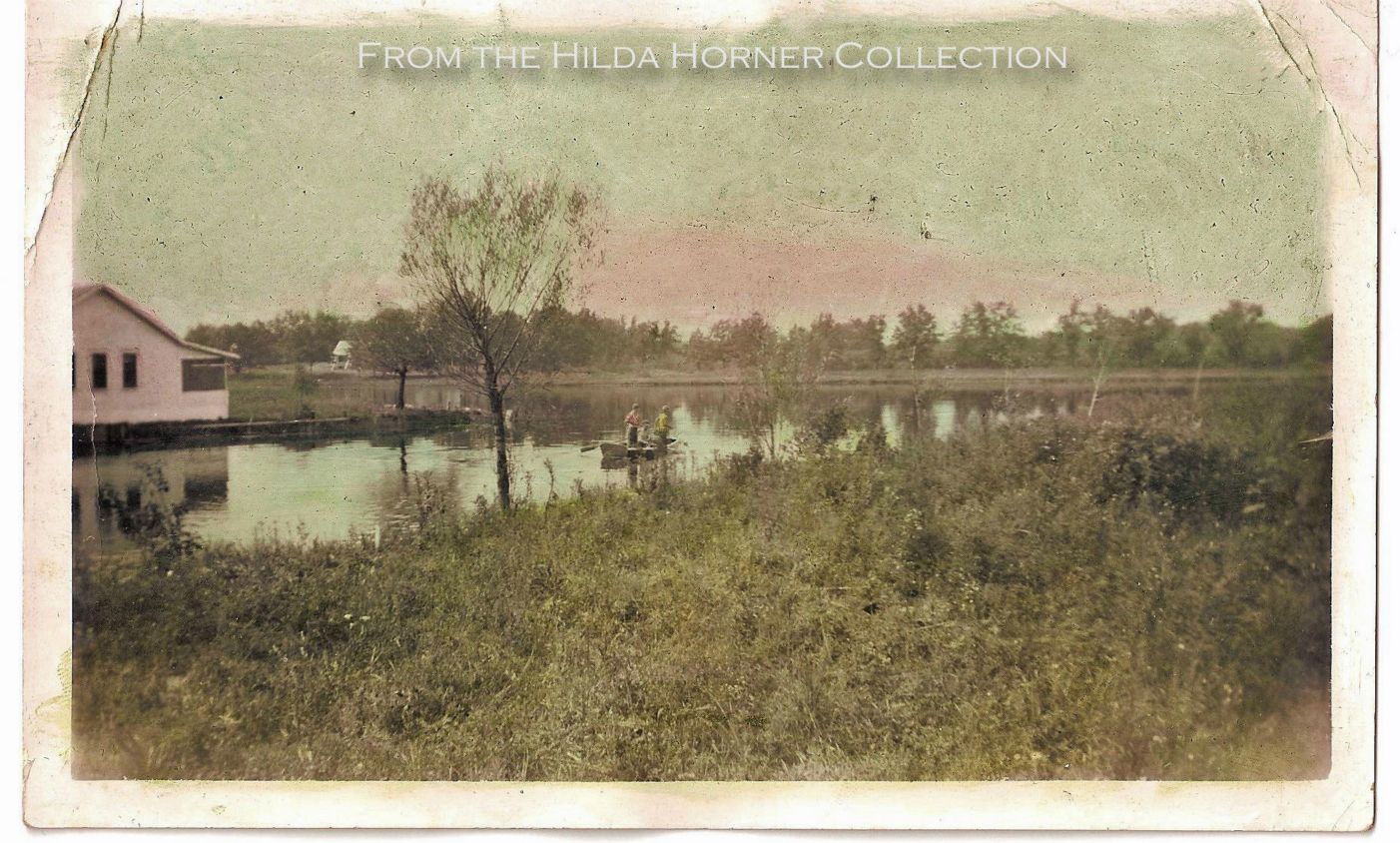 Commerce Lake, Michigan. Circa 1930/1940 Hand colored photograph. Looking west from 'Junior Canal'.
